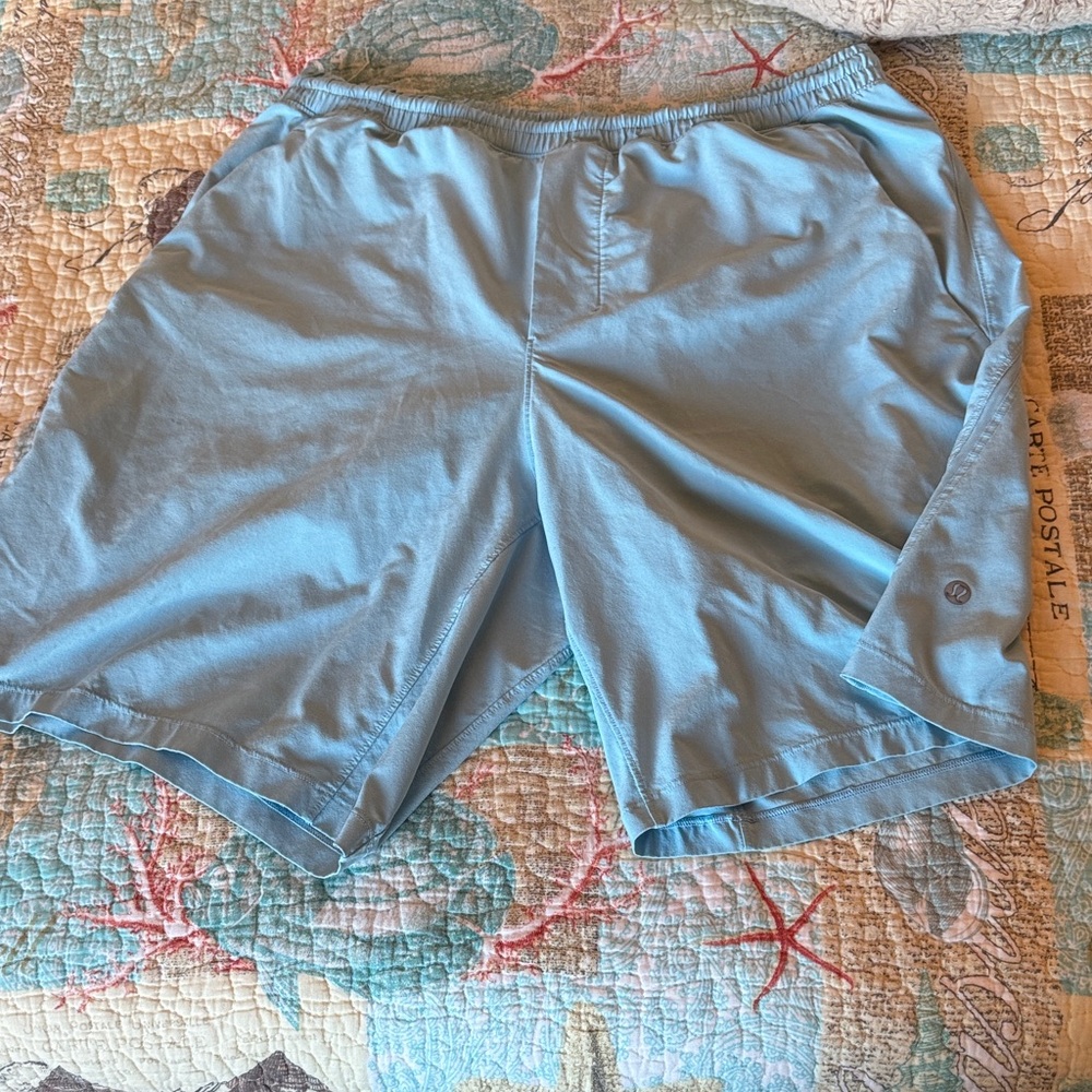 Men’s lululemon athletica pace breaker lined Blue Athletic Shorts 7”size medium